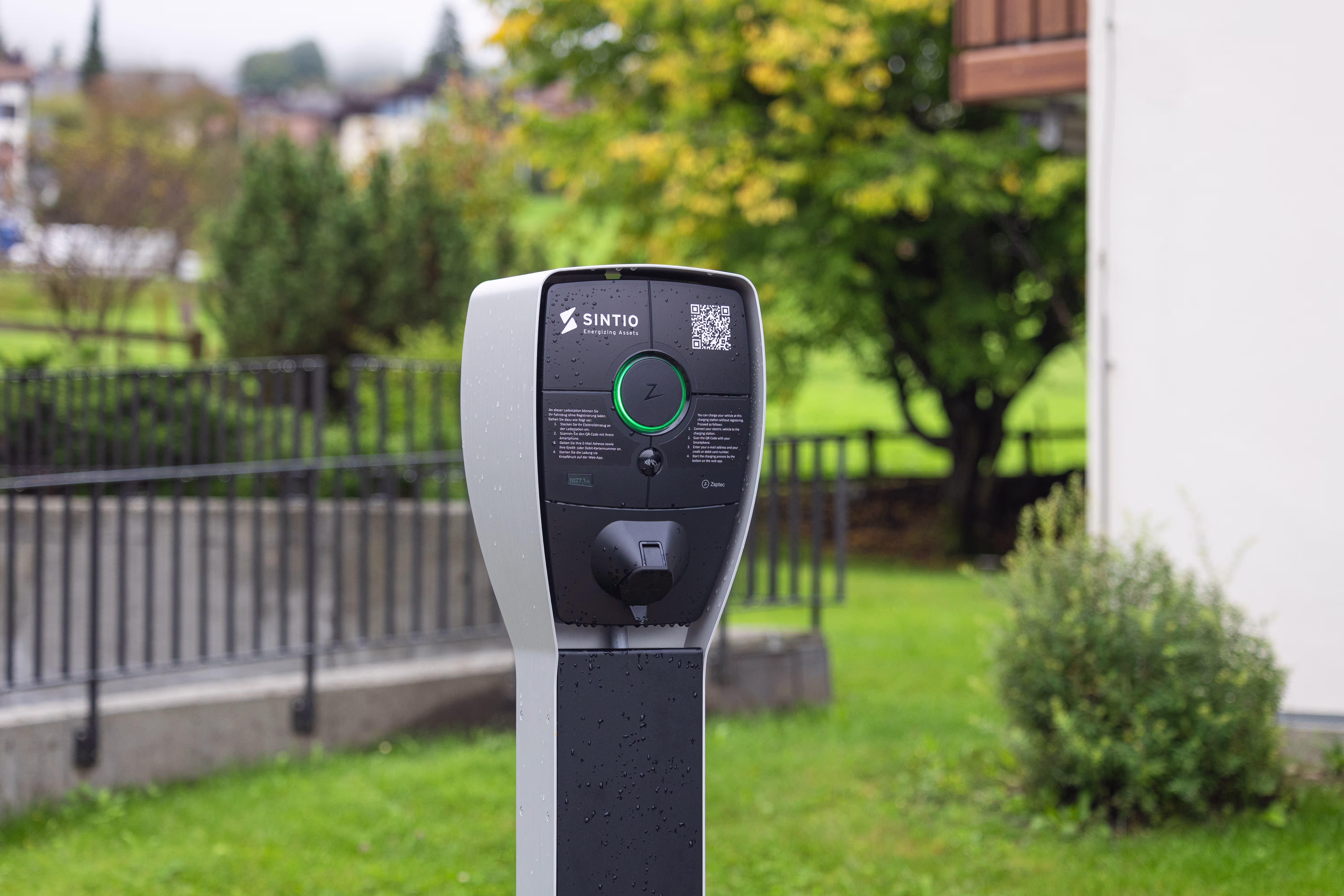 Wall-mounted EV chargers on a brick wall